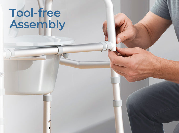 Person assembling the HOMLAND C7 bedside commode frame without tools