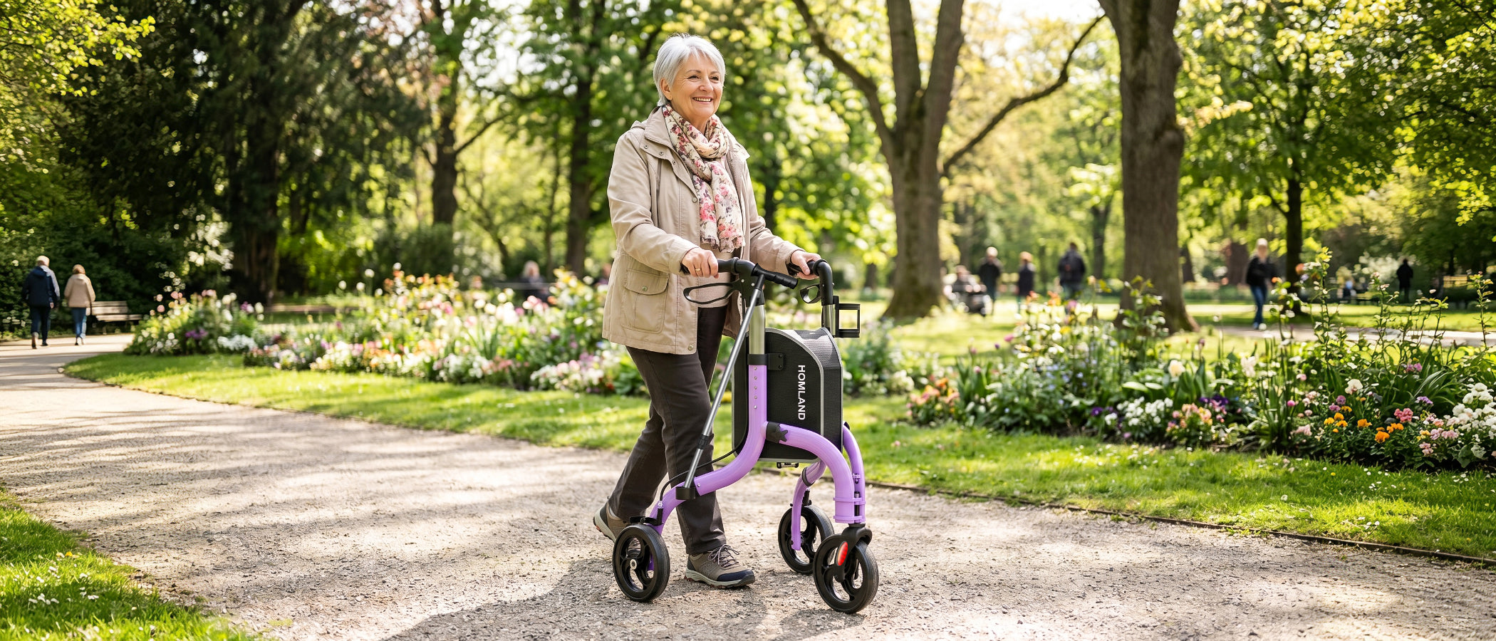 Senior woman using the RW310 walker in the park.